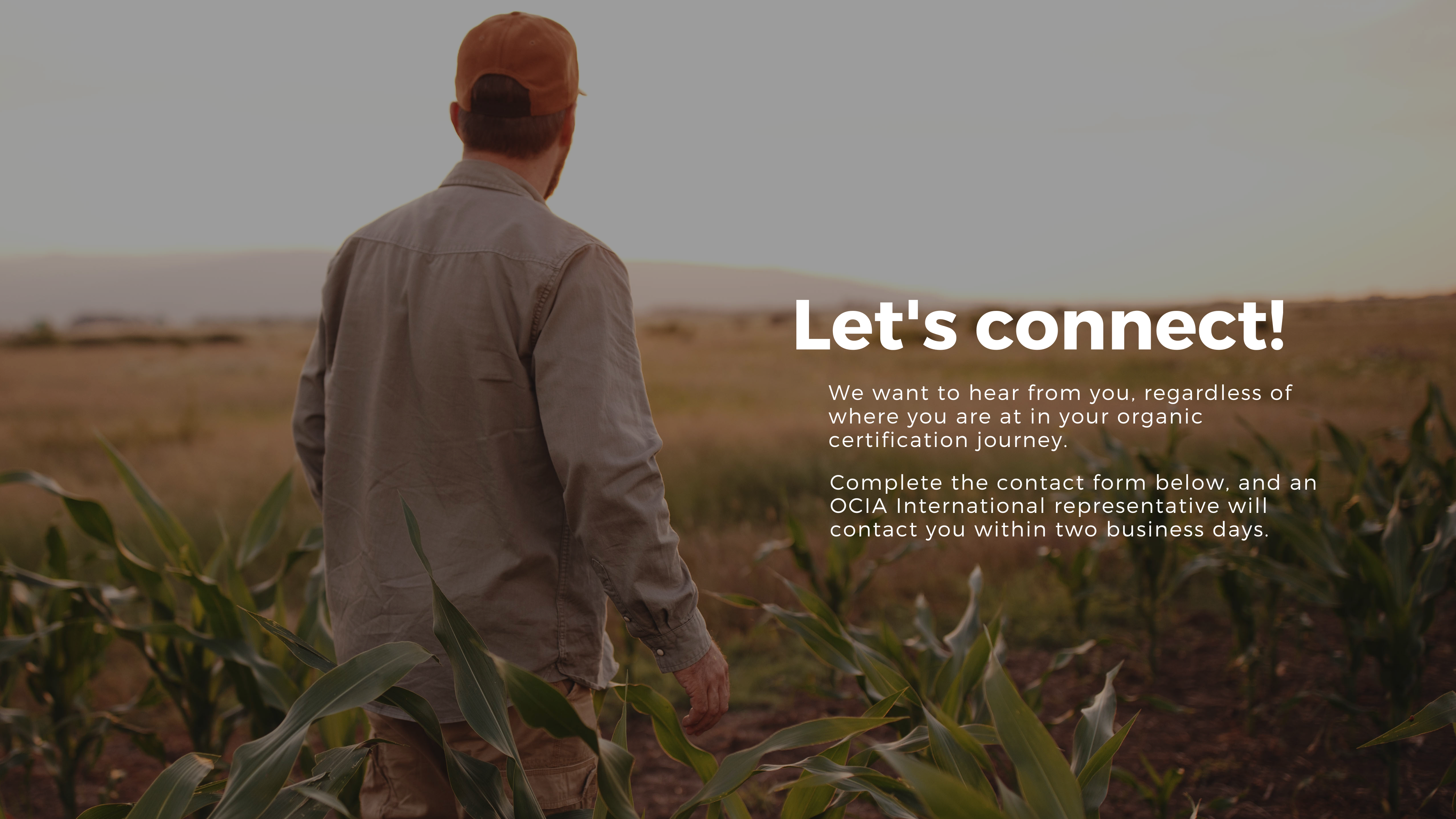 Connect with OCIA International Man standing in field.